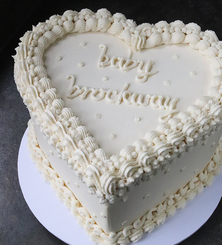 Gluten free celebration cakes – all shapes and flavours. This one is coconut & lime, heart-shaped. Made with yoghurt and coconut milk, filled & frosted with zingy lime buttercream, with piped decoration. All ingredients organic and gluten-free. Milk-free and egg-free celebration cakes also available